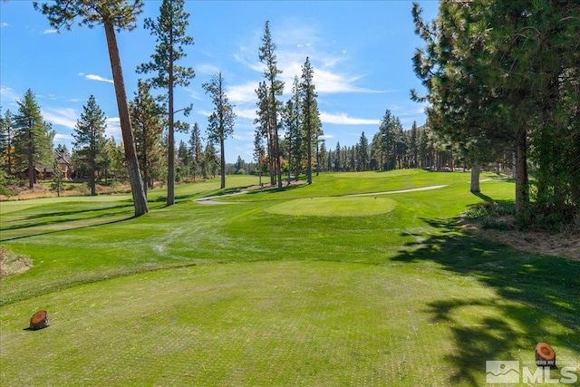 5680 Lausanne Dr, Reno, NV 89511 - view of property's community featuring golf course view, a yard, and view of scattered trees
