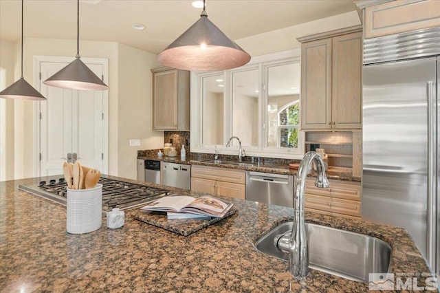5680 Lausanne Dr, Reno, NV 89511 - kitchen with stainless steel appliances, a sink, hanging light fixtures, and recessed lighting