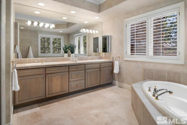 5680 Lausanne Dr, Reno, NV 89511 - full bathroom featuring a garden tub, double vanity, baseboards, and recessed lighting