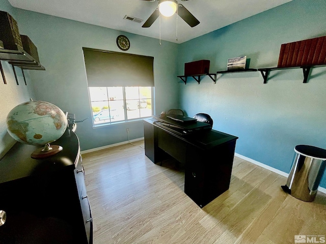 3131 Winter Rose Cir, Reno, NV 89502 - office area featuring light wood finished floors, a ceiling fan, and baseboards