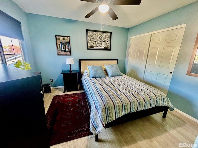 3131 Winter Rose Cir, Reno, NV 89502 - bedroom featuring baseboards, a closet, ceiling fan, and wood finished floors