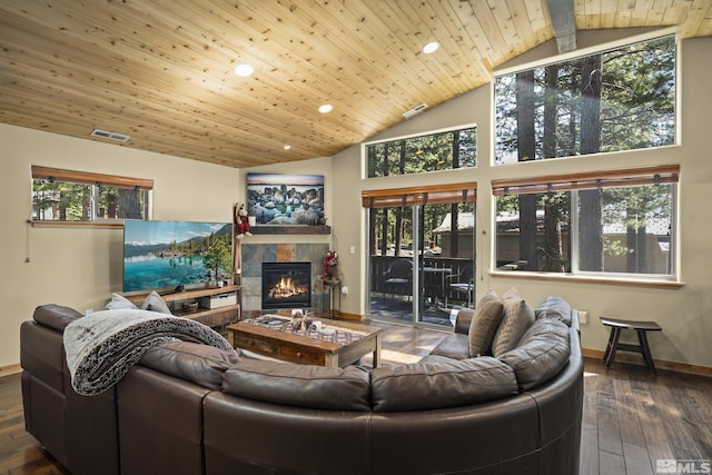 877 Northwood Blvd Unit 2, Incline Village, NV 89451 - living area with vaulted ceiling, a tiled fireplace, recessed lighting, plenty of natural light, and baseboards