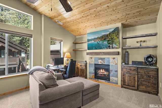 877 Northwood Blvd Unit 2, Incline Village, NV 89451 - carpeted living room with wood ceiling, baseboards, lofted ceiling, a tile fireplace, and a desk