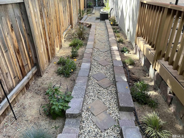 5310 Village Meadows Dr, Sparks, NV 89436 - view of yard with central AC unit and fence