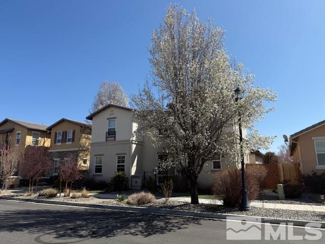 1769 La Cita Way, Minden, NV 89423 - view of front of property with stucco siding, a residential view, and fence