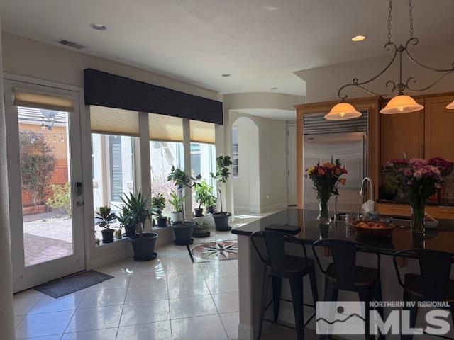 1769 La Cita Way, Minden, NV 89423 - dining area with plenty of natural light, light tile patterned floors, and recessed lighting