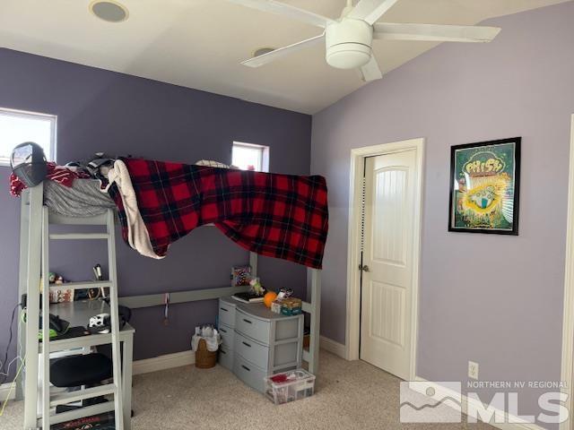 1769 La Cita Way, Minden, NV 89423 - carpeted bedroom with multiple windows, baseboards, and a ceiling fan