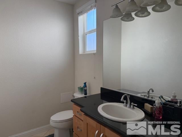 1769 La Cita Way, Minden, NV 89423 - bathroom featuring vanity, toilet, and baseboards