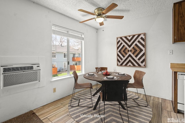 4604 Neil Rd Unit 122, Reno, NV 89502 - dining space with wood finished floors, a ceiling fan, a textured ceiling, and cooling unit