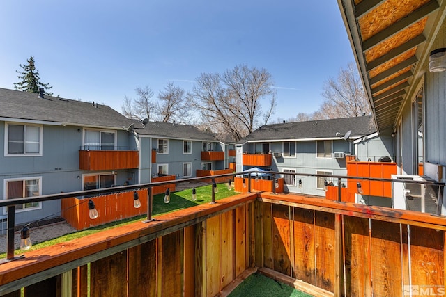 4604 Neil Rd Unit 122, Reno, NV 89502 - wooden terrace with central air condition unit and a residential view