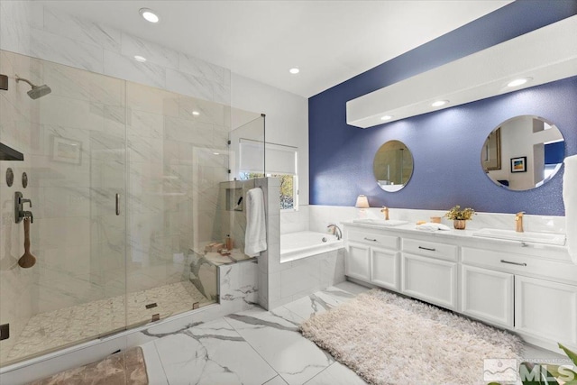 5103 Tucumcari Cir, Reno, NV 89511 - bathroom with a garden tub, a shower stall, marble finish floors, double vanity, and recessed lighting
