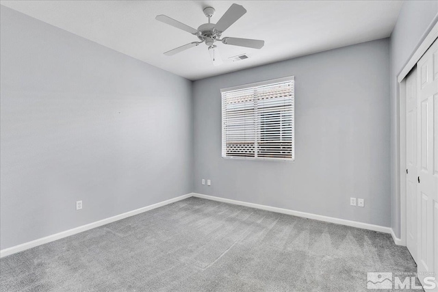 2140 Avella Dr, Sparks, NV 89434 - unfurnished bedroom featuring a closet, carpet flooring, baseboards, and a ceiling fan