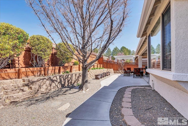 2140 Avella Dr, Sparks, NV 89434 - view of patio with a fenced backyard
