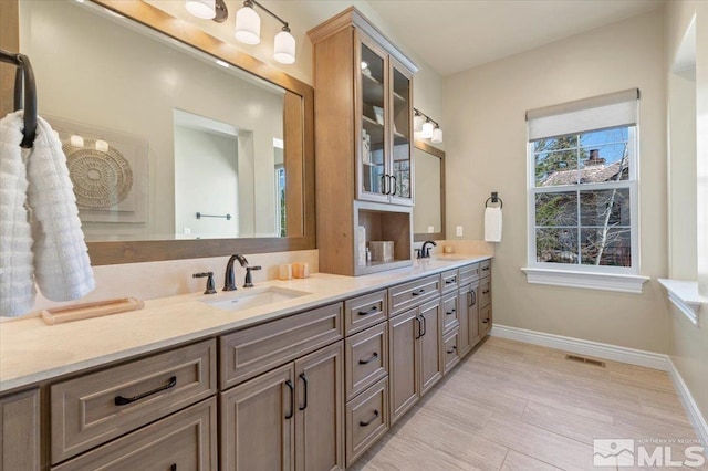 20605 Parc Foret Dr, Reno, NV 89511 - bathroom with baseboards and double vanity