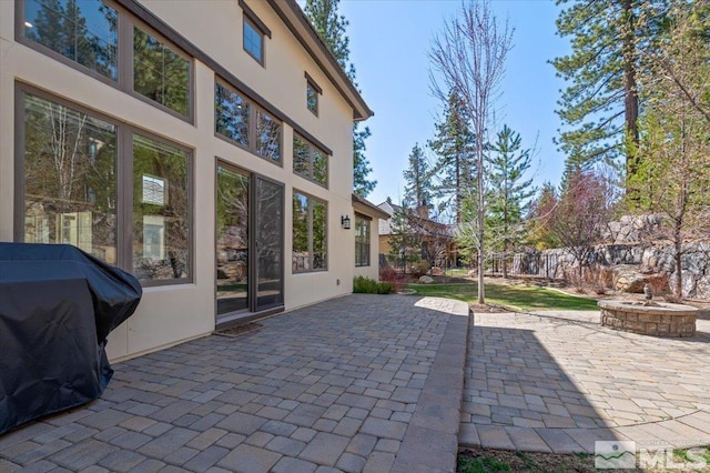 20605 Parc Foret Dr, Reno, NV 89511 - view of patio / terrace with a fire pit and area for grilling