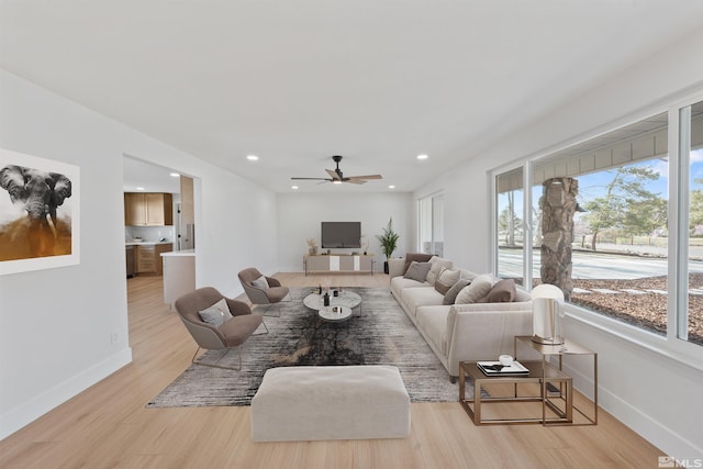 1309 Raeline Ln, Minden, NV 89423 - living area featuring ceiling fan, light wood finished floors, baseboards, and recessed lighting