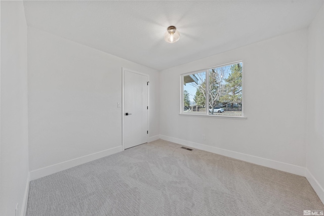 1309 Raeline Ln, Minden, NV 89423 - unfurnished room featuring baseboards and light carpet