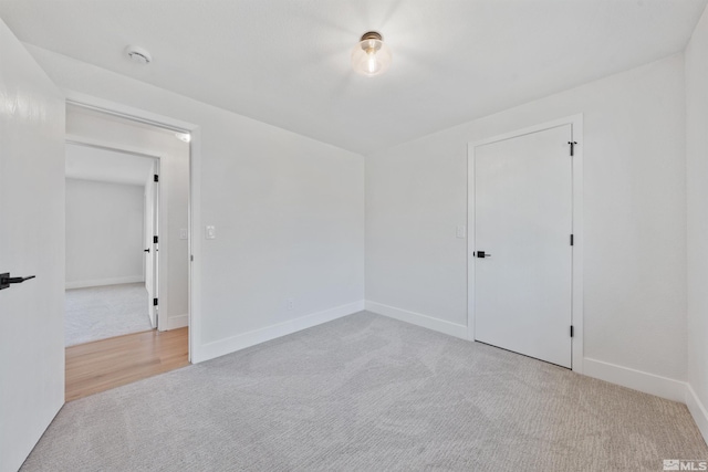 1309 Raeline Ln, Minden, NV 89423 - spare room featuring carpet, a smoke detector, and baseboards