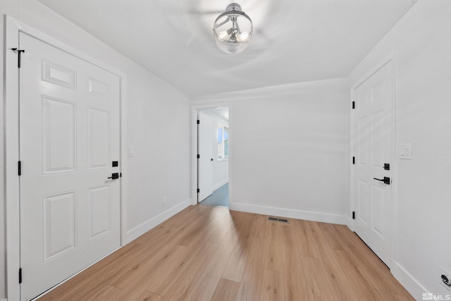 1309 Raeline Ln, Minden, NV 89423 - foyer entrance with light wood-type flooring and baseboards
