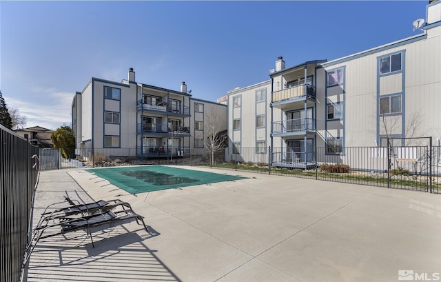 2555 Clear Acre Ln Unit 73, Reno, NV 89512 - community pool featuring fence and a patio