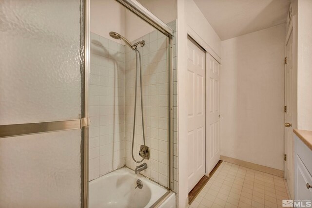 2555 Clear Acre Ln Unit 73, Reno, NV 89512 - bathroom with shower / bath combination with glass door, tile patterned floors, and vanity
