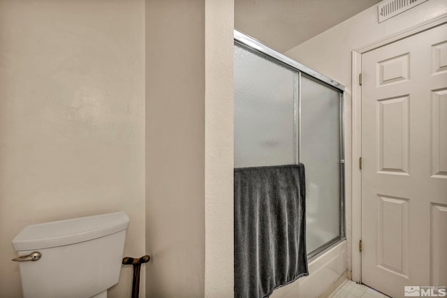 2555 Clear Acre Ln Unit 73, Reno, NV 89512 - full bathroom featuring toilet and shower / bath combination with glass door