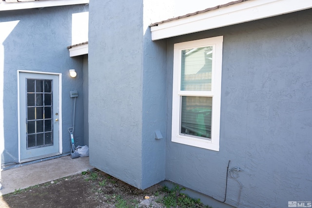 4806 Lincoln Ct, Carson City, NV 89706 - entrance to property featuring stucco siding