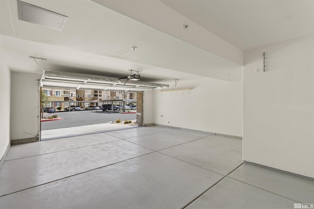 2490 Eastshore Pl, Reno, NV 89509 - garage featuring a garage door opener and baseboards