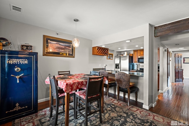759 Boulder Ct Unit M, Stateline, NV 89449 - dining room featuring dark wood finished floors, baseboards, and recessed lighting