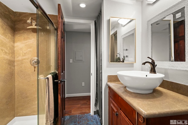 759 Boulder Ct Unit M, Stateline, NV 89449 - full bathroom with a shower stall, vanity, and wood finished floors