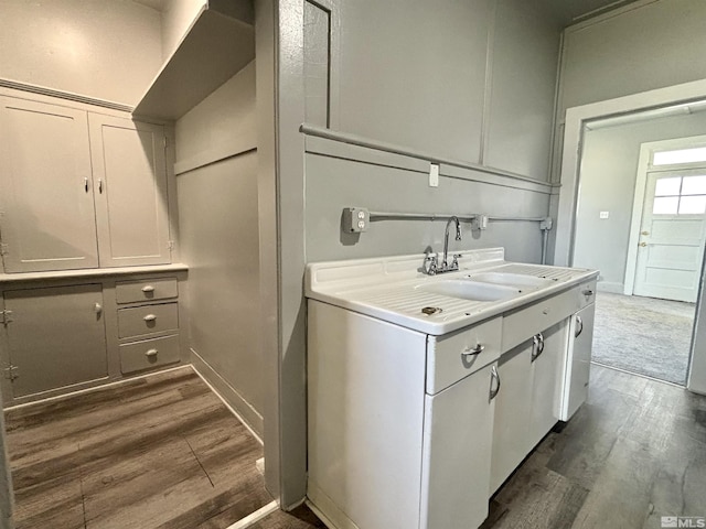 295 Apache St, Imlay, NV 89418 - bathroom with wood finished floors, a sink, and baseboards