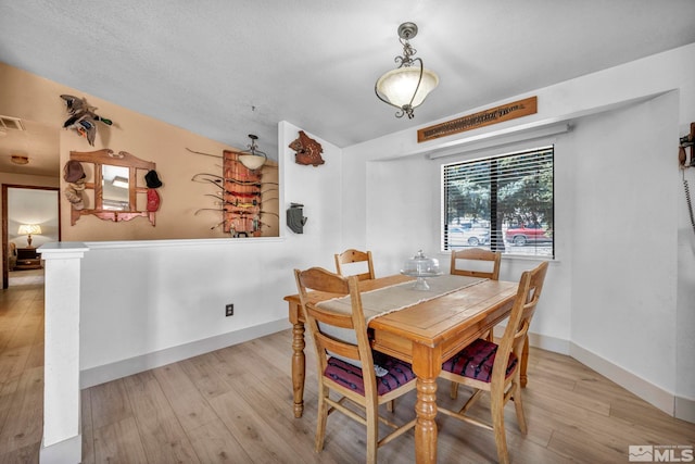 11000 Bighorn Dr, Reno, NV 89508 - dining space with wood finished floors and baseboards