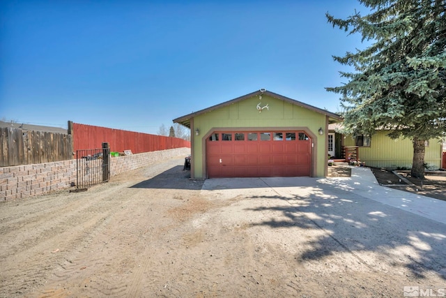 11000 Bighorn Dr, Reno, NV 89508 - view of front of property with an attached garage and dirt driveway
