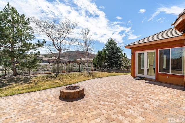 15355 Redmond Loop, Reno, NV 89511 - view of patio featuring an outdoor fire pit
