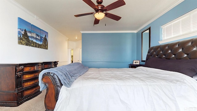 bedroom with crown molding, ceiling fan, and carpet flooring
