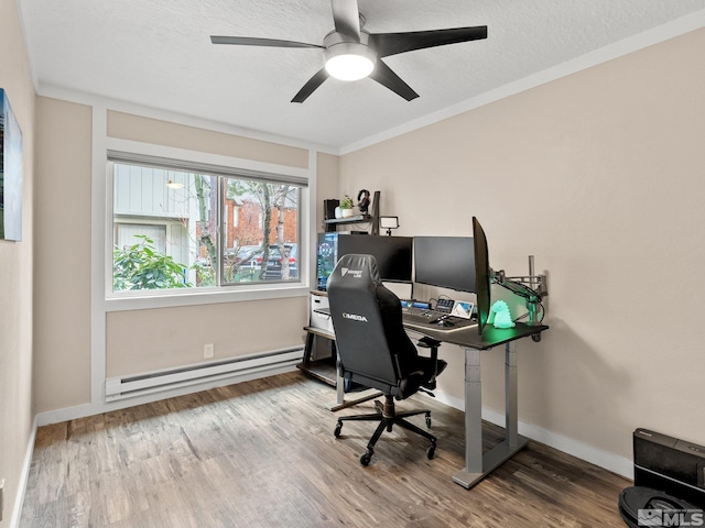 989 Tahoe Blvd Unit 91, Incline Village, NV 89451 - office area featuring baseboard heating, wood finished floors, a ceiling fan, baseboards, and a textured ceiling