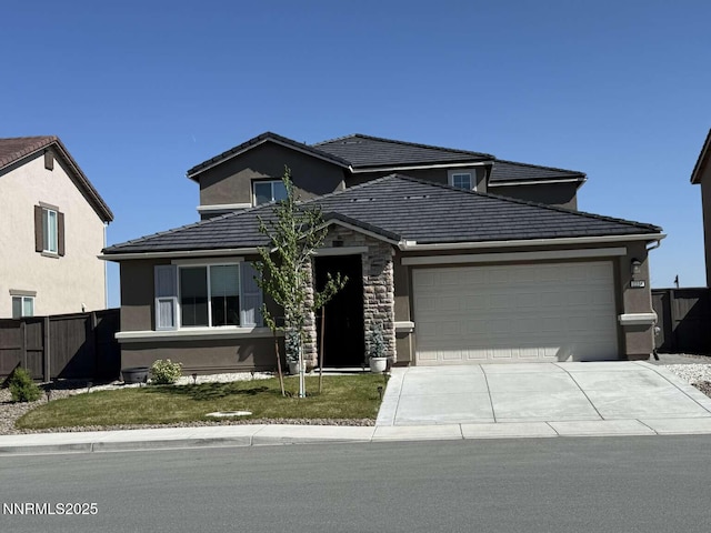 2234 Great Bluffs Ln, Sparks, NV 89436 - traditional home with an attached garage, driveway, and stucco siding