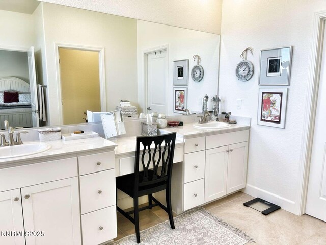 2234 Great Bluffs Ln, Sparks, NV 89436 - full bath featuring two vanities and tile patterned flooring