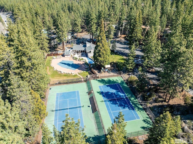 drone / aerial view of a heavily wooded area