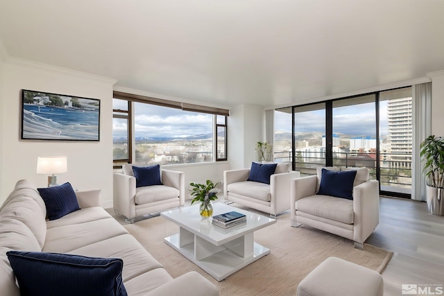 280 Island Ave Unit 1103, Reno, NV 89501 - living room featuring light wood finished floors, expansive windows, and ornamental molding