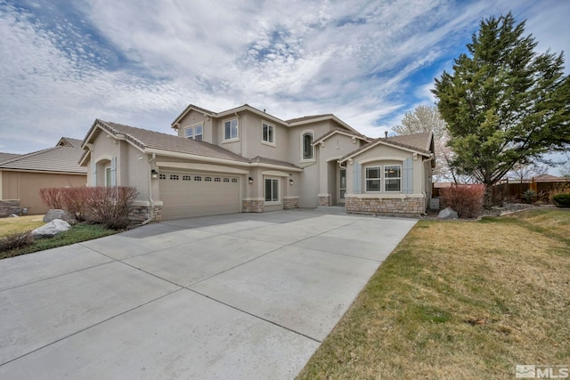 6647 Fabric Dr, Sparks, NV 89436 - view of front facade featuring stone siding, stucco siding, concrete driveway, and a garage
