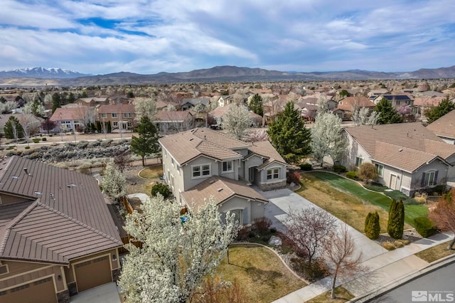 6647 Fabric Dr, Sparks, NV 89436 - aerial perspective of suburban area featuring a mountain backdrop