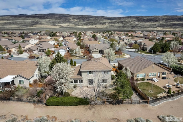 6647 Fabric Dr, Sparks, NV 89436 - aerial view of residential area featuring a mountain backdrop