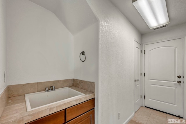 6647 Fabric Dr, Sparks, NV 89436 - bathroom with tile patterned flooring and a sink