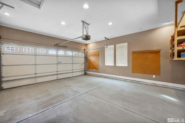 6647 Fabric Dr, Sparks, NV 89436 - garage featuring a garage door opener and recessed lighting
