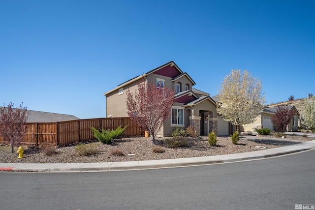 2575 Piero Ct, Sparks, NV 89434 - view of front of house with fence, stucco siding, and an attached garage