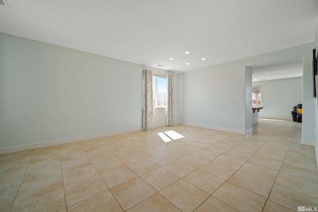 2575 Piero Ct, Sparks, NV 89434 - unfurnished room with light tile patterned floors, recessed lighting, and baseboards