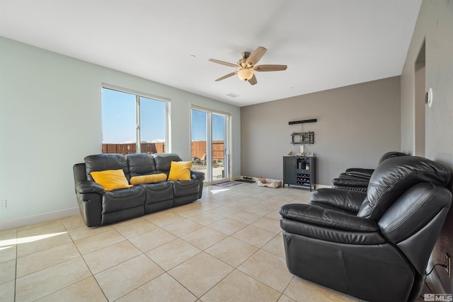 2575 Piero Ct, Sparks, NV 89434 - living room featuring a ceiling fan, light tile patterned floors, and baseboards