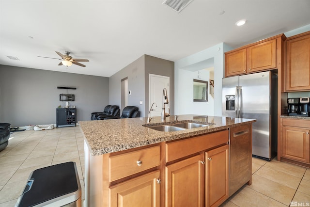 2575 Piero Ct, Sparks, NV 89434 - kitchen featuring appliances with stainless steel finishes, a sink, light tile patterned floors, and a ceiling fan