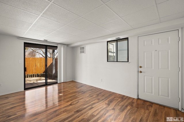2193 Kietzke Ln Unit C, Reno, NV 89502 - unfurnished room featuring a paneled ceiling, wood finished floors, and baseboards